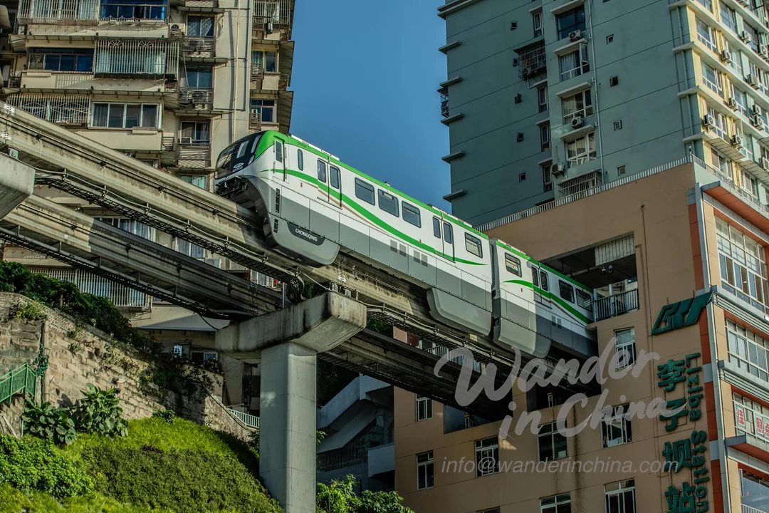 Chongqing Rail Transit passing through a building.