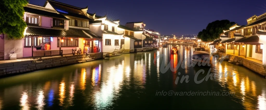 Night view of Zhujiajiao water town with illuminated canals.
